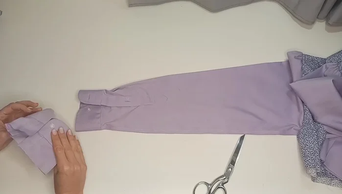 Determine sleeve length and cut, subtracting an inch. Cut cuffs from the third shirt and sew to the sleeves, adding gathers if necessary.