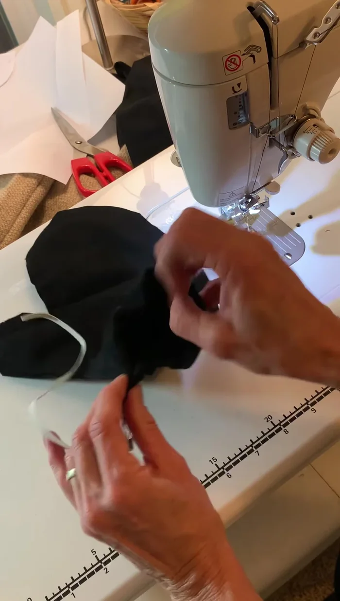 Secure the elastic: Sew the ends of the elastic together, overlapping them slightly, and backstitch to secure. 