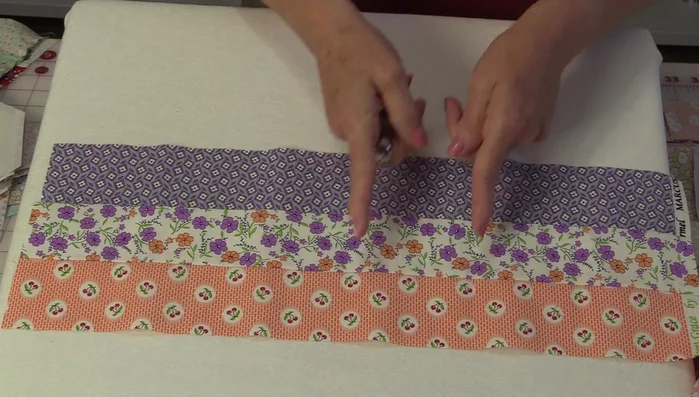 Mix up the outer segments and assemble the nine-patch blocks.