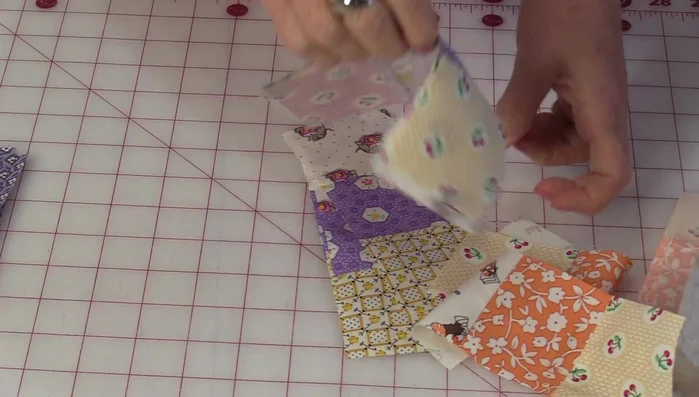 Mix up the outer segments and assemble the nine-patch blocks.