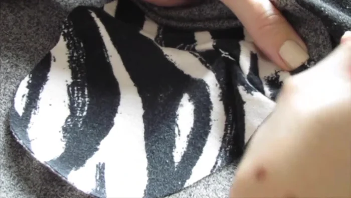 Repeat the ladder stitch at least twice to secure the pocket's top edge.