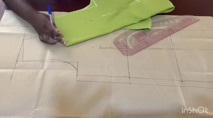 Connect the points to form the front neckline, adjusting the depth as needed. Mark 3.5 inches from the top of the neckline along the center front.