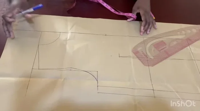 Connect the points to form the front neckline, adjusting the depth as needed. Mark 3.5 inches from the top of the neckline along the center front.