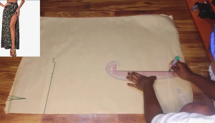 Connect the hip measurement points to the full skirt length to create the A-line flare. Cut the pencil skirt shape from the fabric, then add the flare later.