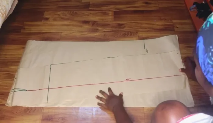 Cut out the back pattern piece, adding the same flare as the front.