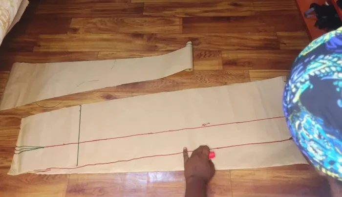 Cut out the back pattern piece, adding the same flare as the front.