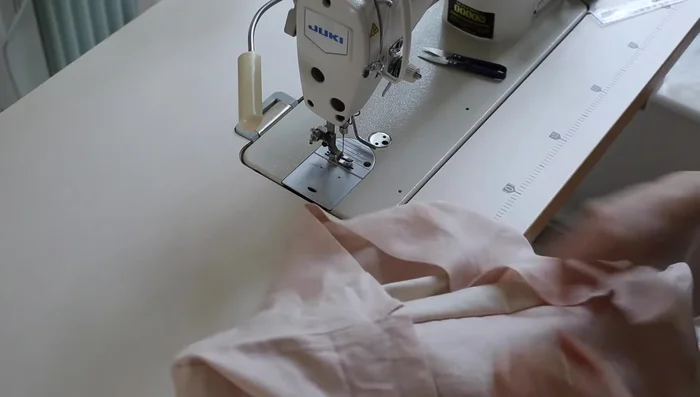 Turn the bag right side out through the gap in the lining, reinforce stitching, and close the gap. Top stitch along the top seam to secure the drawstring and lining.