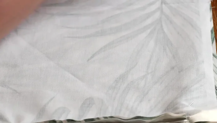 Sew the pillow seams together using a standard straight stitch or zipper foot, leaving a gap for turning.