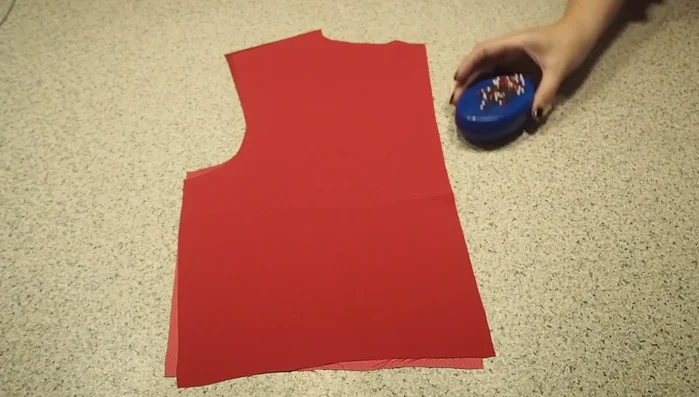 Prepare the back piece: Sew the center back seam, press it open, and finish the raw edges with a neat stitch.
