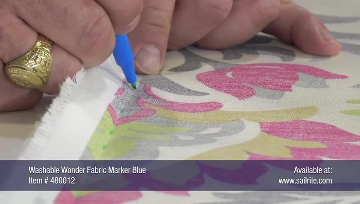 Pinning for sewing: Unfold the top fabric, ensuring the pattern still matches. Re-pin the fabric along the crease lines, ensuring each pin is centered on the marked line. Insert pins perpendicular to the selvage edge, about every three inches. Add extra pins horizontally to prevent slippage.