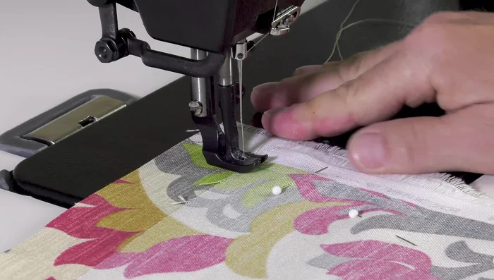 Sewing the panels: Sew along the marked lines, using a light thread, small needle, and reduced tension to prevent puckering. Start with reverse stitching to lock the seam, then sew directly over the dash marks.