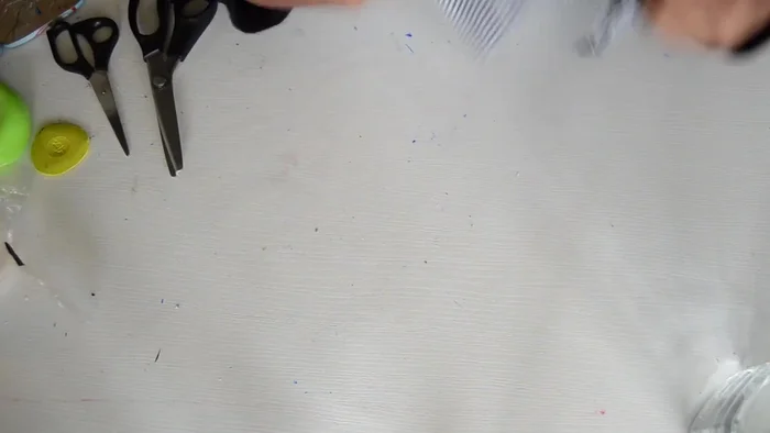 Sew the center front stitch of the blouse, leaving the neckline open. Hem the neckline opening.