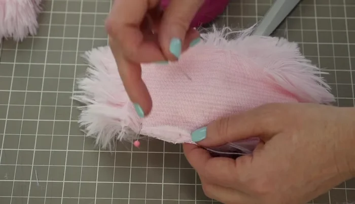 Pin and sew the fabric pieces together. If seams are bulky, use a hammer or rolling pin to flatten them.