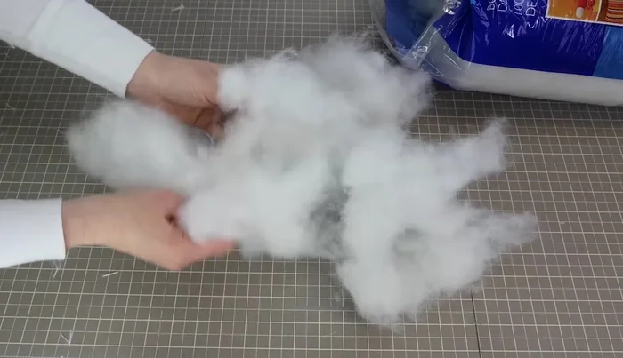 Fluff stuffing before inserting into the plushie to ensure even distribution and better shaping.