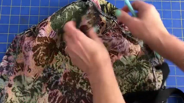 Secure the drawstring ends to the cover.