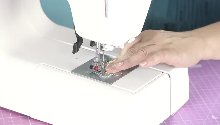 Flatten the strip, ensuring the seam is centered, and top stitch both sides for neatness.