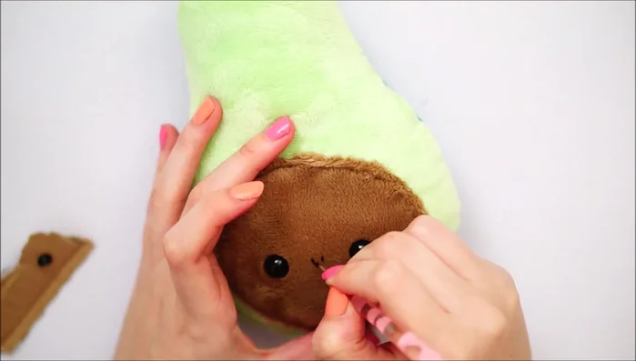 Apply blush to the cheeks.