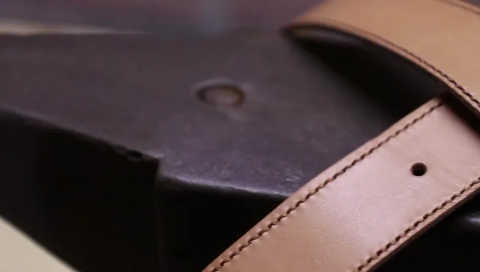 Finish the belt: Apply leather conditioner.