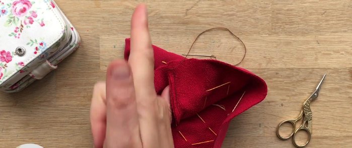 Use a running stitch around the edge, leaving a gap for stuffing. Ensure you use double threaded strong yarn for this stitch.