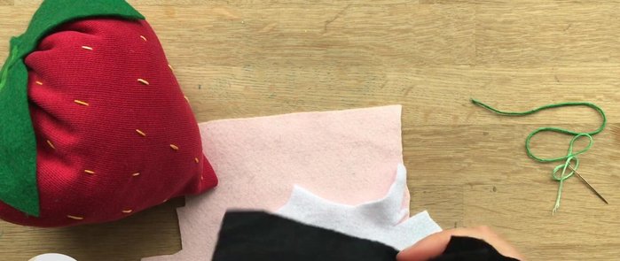 Add facial features using felt and glue (or sew them on).