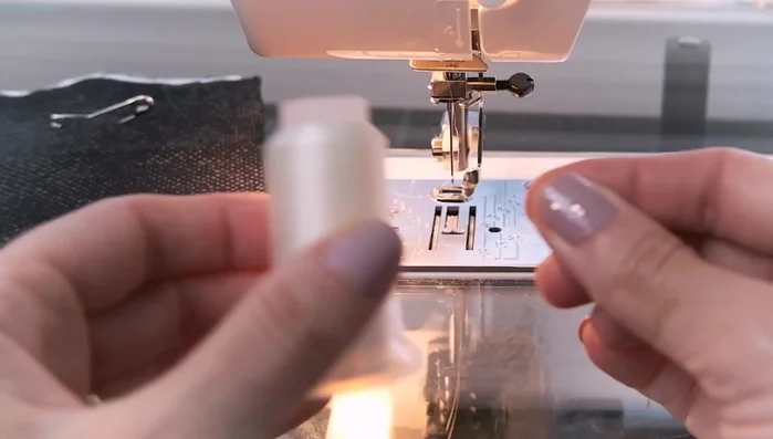 Drop the feed dogs: This gives you complete control over the fabric movement during free motion quilting. Consult your sewing machine manual for instructions.