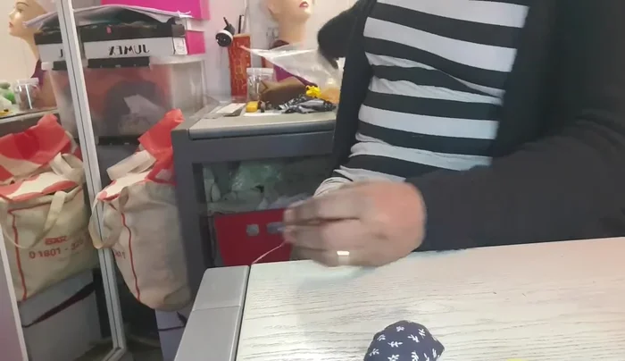 Assemble the penguin: Attach the arms and feet to the body. Hand-sew the opening on the back of the body closed.