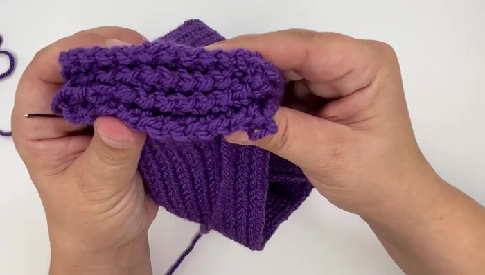 Turn the headband over and adjust for a final twisted look.