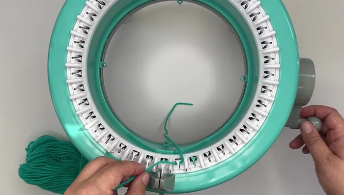 Join main color yarn, leaving a long tail for sewing.