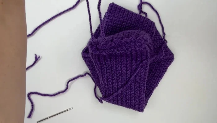 Turn the headband over and adjust for a final twisted look.