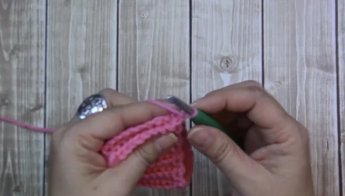 Chain 1, bring both ends together, slip stitch all the way down to join.