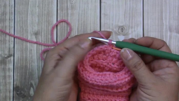 Rounds 10-15: One half double crochet in each stitch (back loop only). Try on and adjust height as needed.