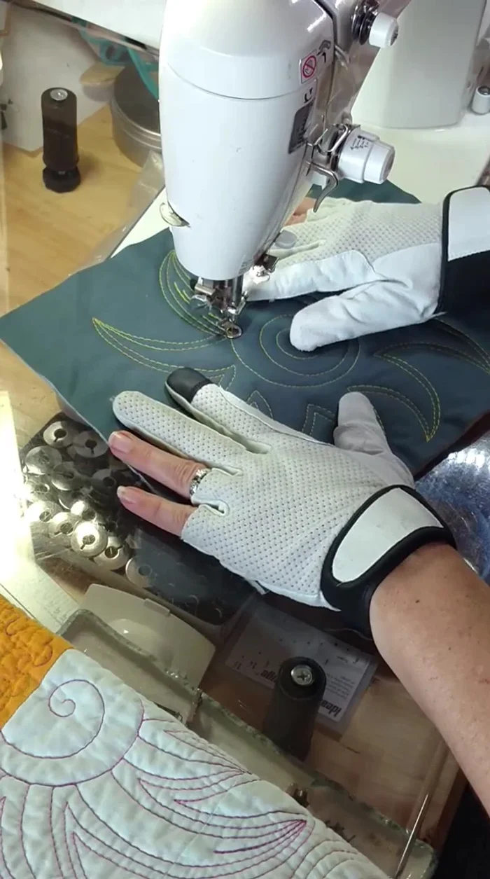 Add some additional lines from the center to enhance the sunburst, using travel stitches or straight lines to connect them as desired.