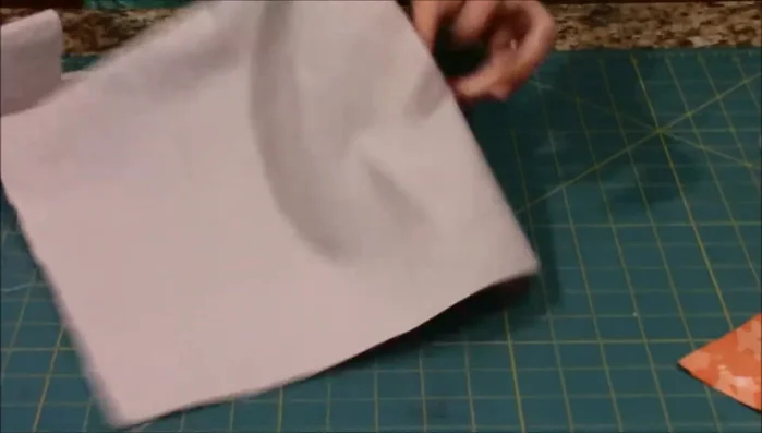 Sew all the way around the backing pieces. No need to leave an opening; the envelope closure creates the opening for inserting the pillow.