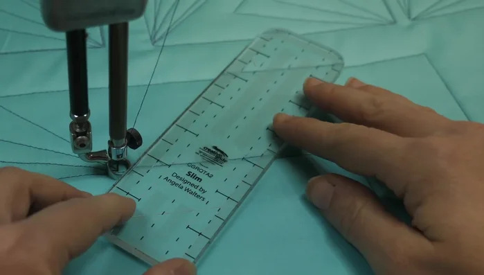 When approaching a corner, stop and plan the next few lines to ensure a smooth transition. Adjust the size of the last triangles if needed to maintain consistency.