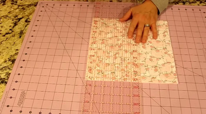 Cut fabric into 10x10 squares. Create quilt sandwiches: backing (right side down), fleece, top fabric (right side up). Pin together.