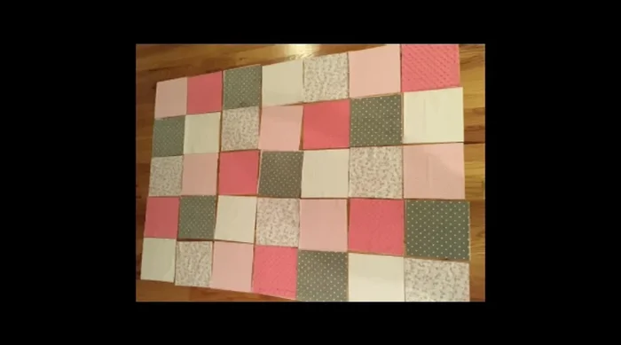 Arrange squares in desired layout, considering nap direction of fabrics (especially cuddle fabrics). Take a picture for reference.