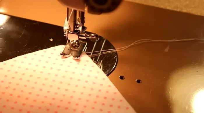 Stitch an 'X' across the middle of each square using your sewing machine.