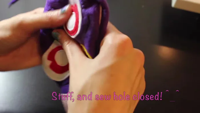 Sew around the pinned line, leaving a hole to turn the plushie right side out, stuff it, and sew the hole closed.