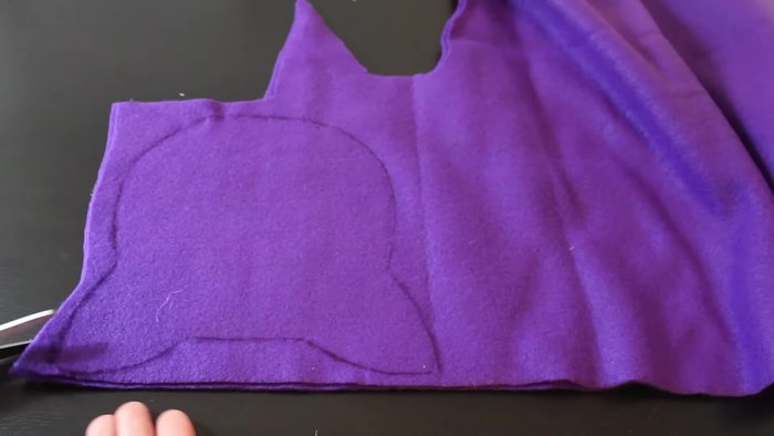 Trace your design onto folded fabric again, adding a 1/4 inch hem allowance all around, and cut it out.