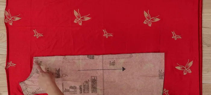 If a pattern needs to be placed on a fold, cut half, unfold, flip, and cut the other half to create a single whole piece.