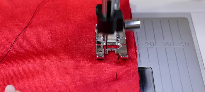 If fabric is difficult to feed, use tissue paper on top.