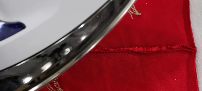 For hemming, pink the raw edge, fold, and hand- or machine-blind stitch, or use a twin needle for stretch.