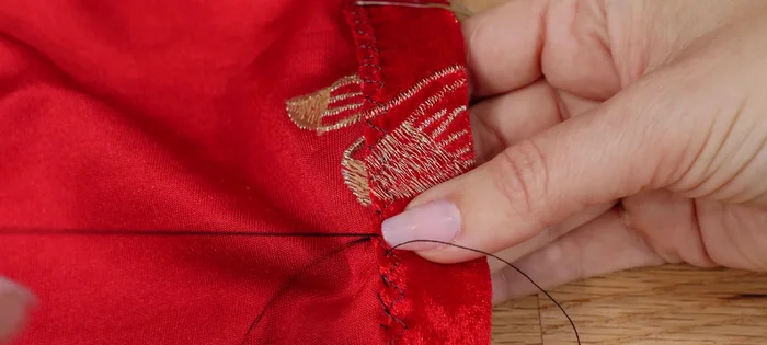 For hemming, pink the raw edge, fold, and hand- or machine-blind stitch, or use a twin needle for stretch.