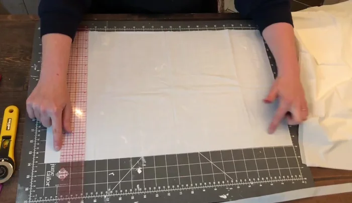 Comb through the cut strips to separate them. Unfold the piece completely, being careful not to pull too hard.