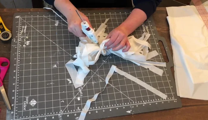 For extra stability, add a dab of glue in the center of the tassel and pinch together.