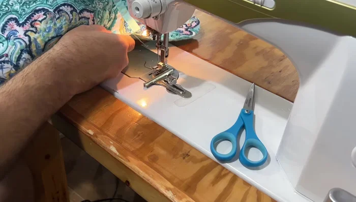 Attach second layer: Attach the second layer of the envelope closure, aligning center points and sewing with a 1/4-inch seam allowance.