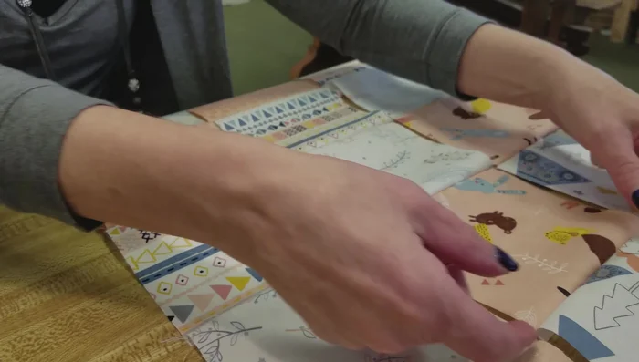 Finger press seams: Before adding borders, finger press the seams of each row in alternating directions to make attaching borders easier.