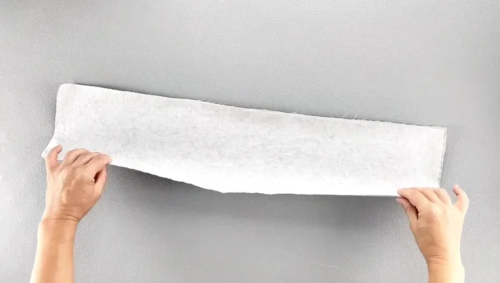 Press the waistband seam down.