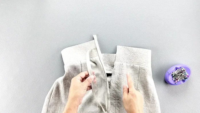 Turn the pants inside out and close the zipper to align both sides.