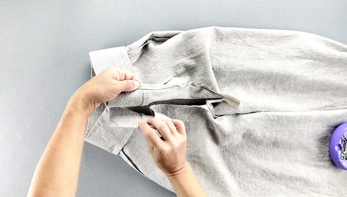 Fold and sew the zipper tape to the inside of the waistband.